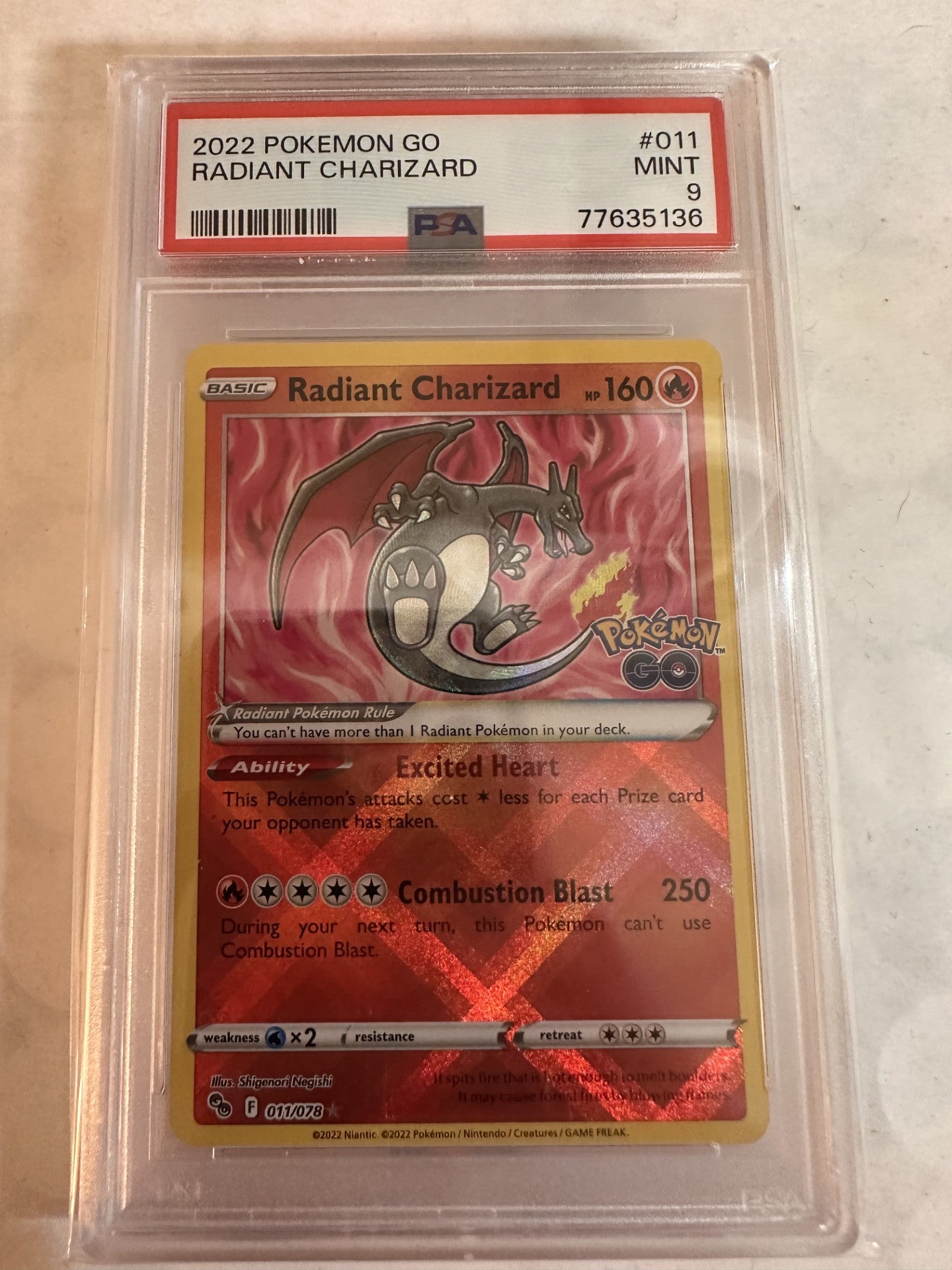 Radiant Charizard PSA 9 Mint graded slab — Pokemon Go 011/078